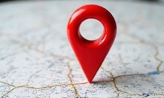 Map pin icon on a stylized map